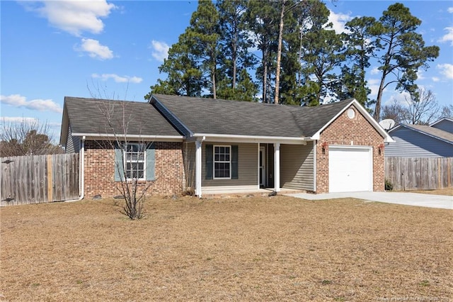 ranch-style home with a garage and a front yard