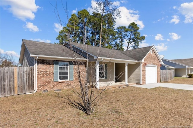 single story home with a garage and a front lawn