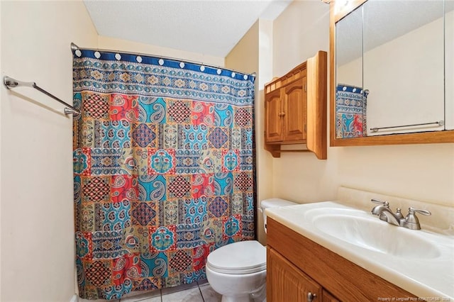 bathroom featuring vanity, walk in shower, toilet, tile patterned floors, and a textured ceiling