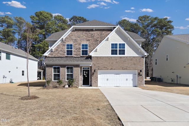 view of front facade featuring a garage, driveway, roof with shingles, a front lawn, and brick siding