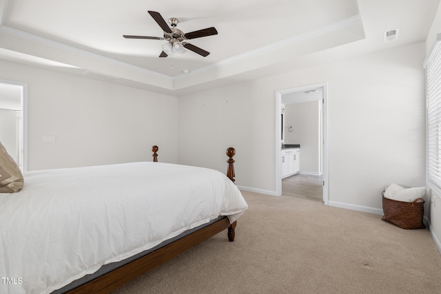 bedroom featuring baseboards, visible vents, a raised ceiling, ornamental molding, and carpet flooring