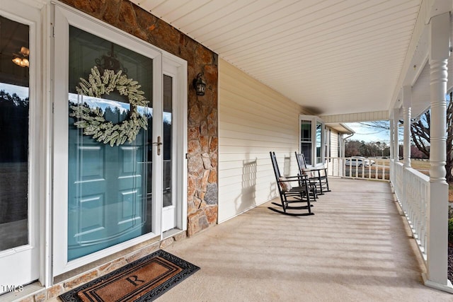 wooden deck featuring a porch