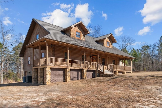 526 Grimble Dr, Linden, NC 28356 - cabin featuring covered porch and central air condition unit