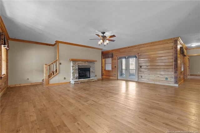 526 Grimble Dr, Linden, NC 28356 - unfurnished living room featuring french doors, ornamental molding, ceiling fan, and light hardwood / wood-style flooring
