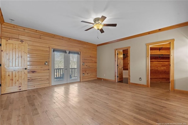 526 Grimble Dr, Linden, NC 28356 - interior space with wooden walls, ornamental molding, access to outside, light hardwood / wood-style floors, and french doors