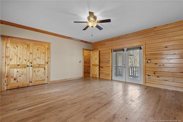 526 Grimble Dr, Linden, NC 28356 - interior space featuring ceiling fan, wood-type flooring, ornamental molding, access to outside, and wood walls