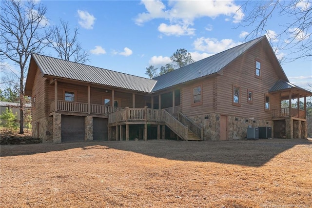 526 Grimble Dr, Linden, NC 28356 - back of house featuring central AC and a garage