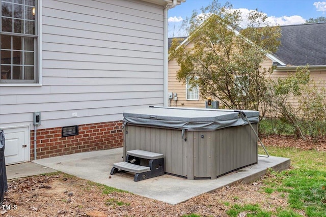 view of patio / terrace featuring a hot tub