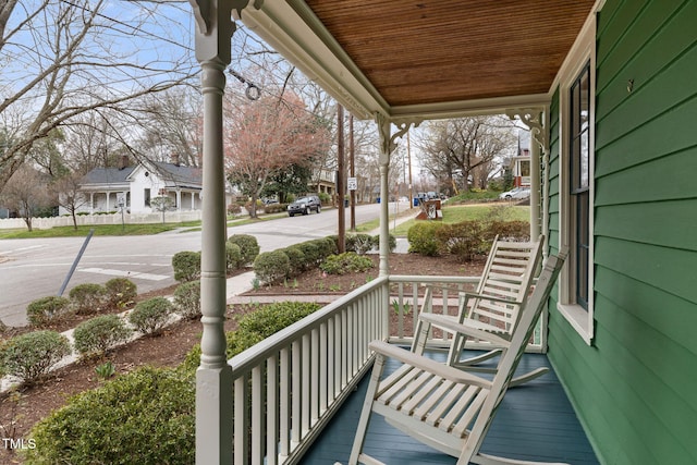 exterior space with a residential view and a porch