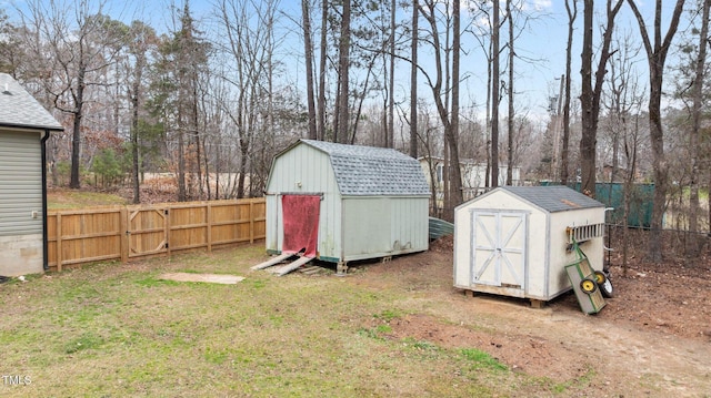 view of shed with a fenced backyard