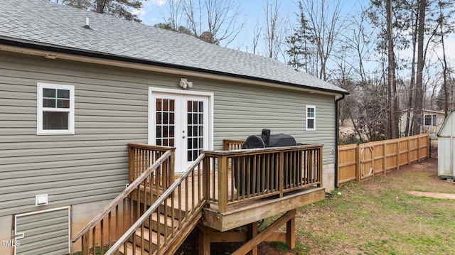 wooden terrace with french doors, fence, and stairs