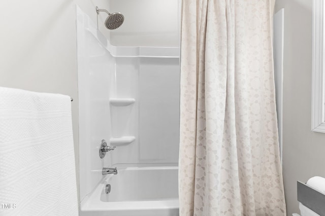 full bath with shower / bathtub combination with curtain