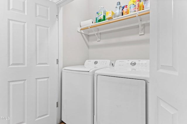 washroom with laundry area and washing machine and clothes dryer