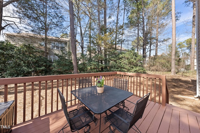 deck with outdoor dining space