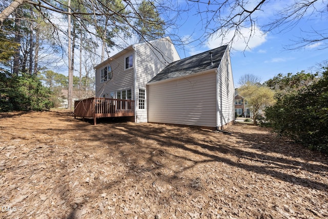 rear view of house with a deck