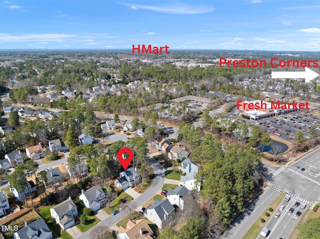 birds eye view of property with a residential view