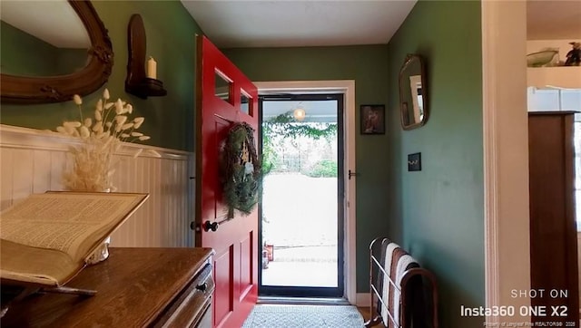 doorway to outside featuring radiator