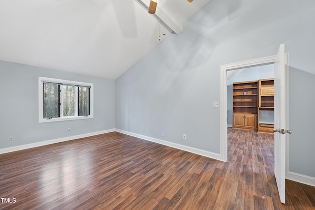 interior space with ceiling fan, lofted ceiling with beams, and dark hardwood / wood-style floors