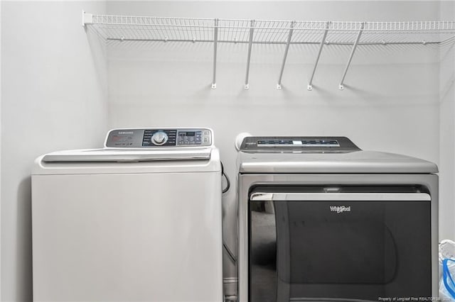 laundry area featuring separate washer and dryer