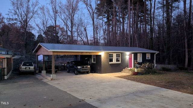 exterior space with a carport