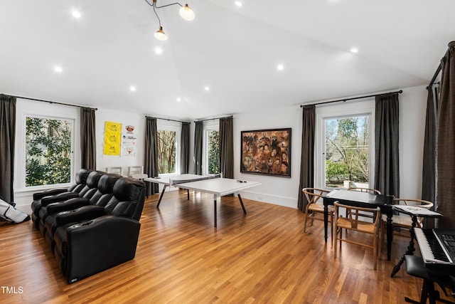 game room with light wood-type flooring, baseboards, vaulted ceiling, and recessed lighting