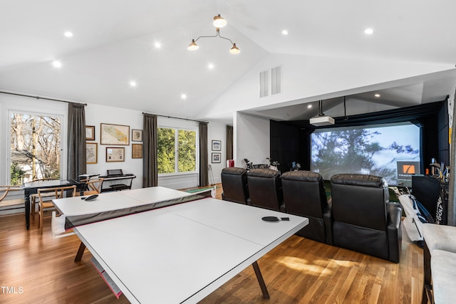 recreation room featuring high vaulted ceiling, visible vents, wood finished floors, and recessed lighting