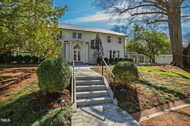 view of front of home featuring french doors and metal roof