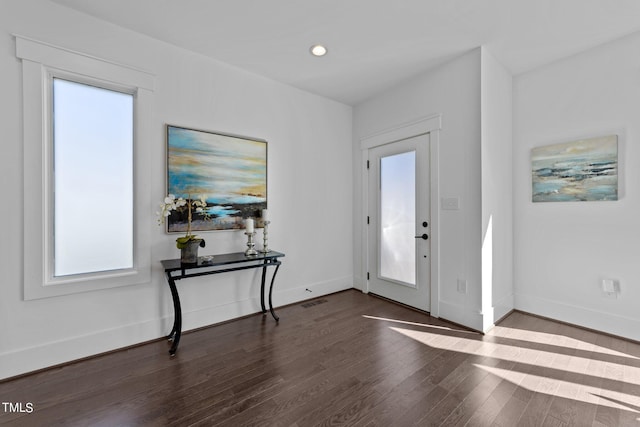 entryway with hardwood / wood-style flooring