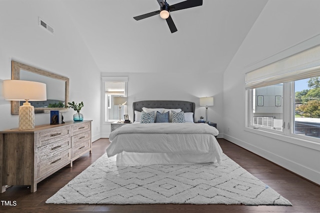 bedroom with lofted ceiling, dark hardwood / wood-style flooring, and ceiling fan