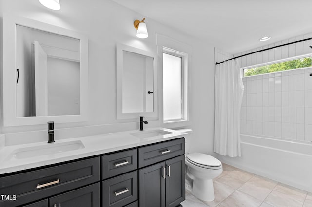 full bathroom with vanity, shower / bathtub combination with curtain, tile patterned floors, and toilet