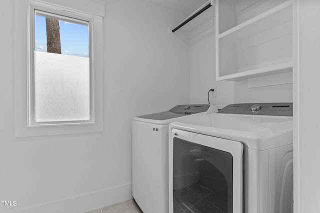 laundry room featuring washing machine and dryer