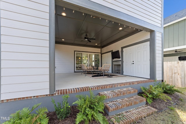 view of patio / terrace featuring ceiling fan