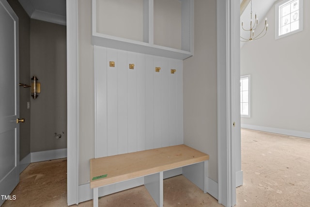 mudroom with plenty of natural light and a notable chandelier