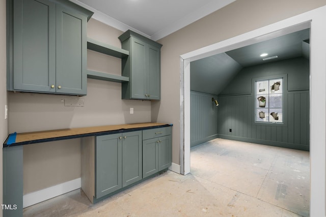 kitchen featuring vaulted ceiling, open shelves, and baseboards