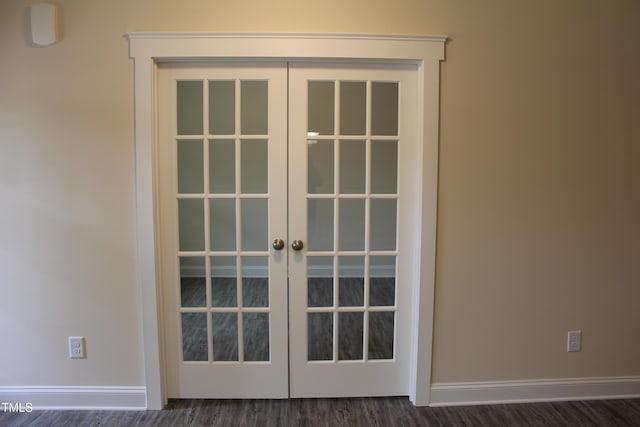 interior details with wood-type flooring and french doors
