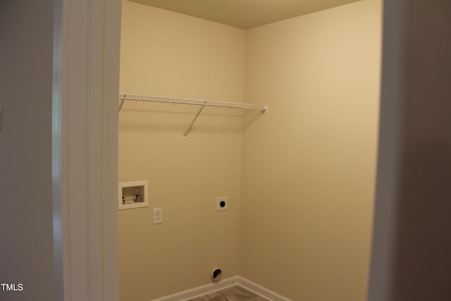 clothes washing area with electric dryer hookup and hookup for a washing machine