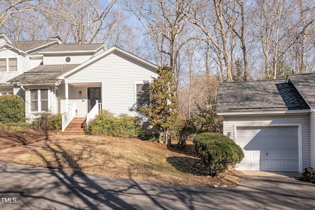 view of front of property with a garage