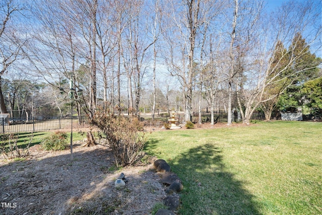 view of yard with fence