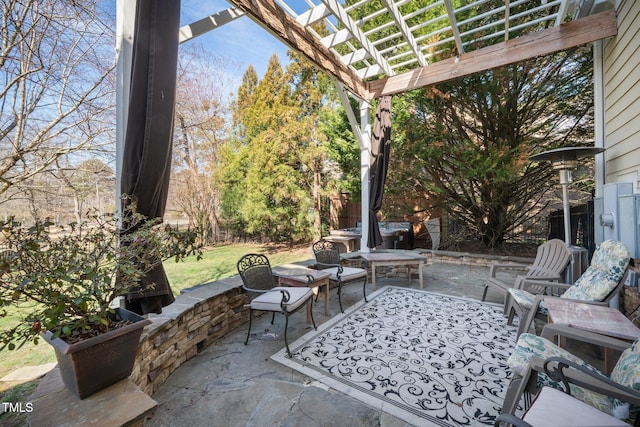 view of patio / terrace featuring fence and a pergola