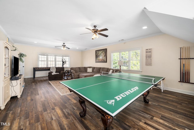 recreation room featuring ornamental molding, dark wood-style flooring, a healthy amount of sunlight, and baseboards