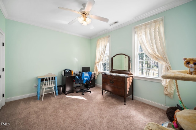 home office with carpet floors, baseboards, visible vents, and crown molding