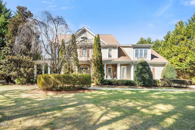 view of front of property with a front lawn