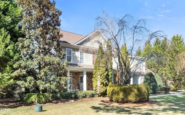 view of front of home with a front yard