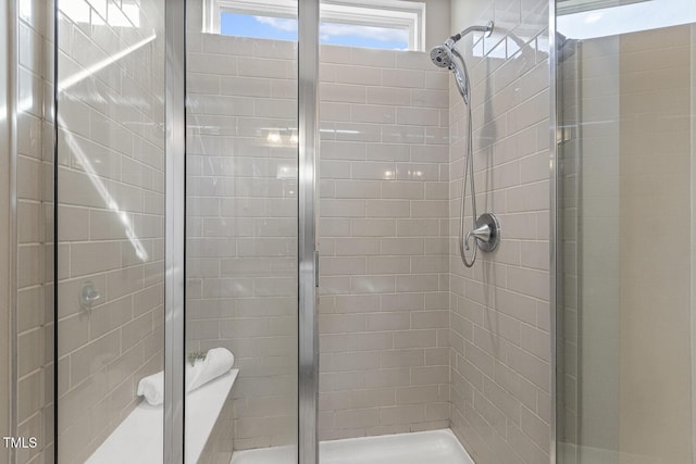 bathroom featuring a stall shower