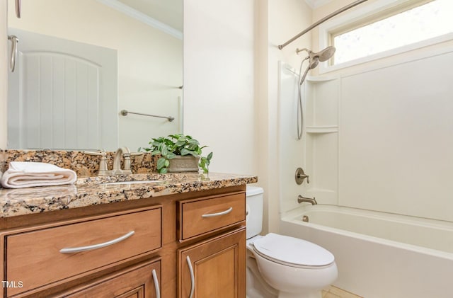 bathroom with shower / washtub combination, crown molding, vanity, and toilet