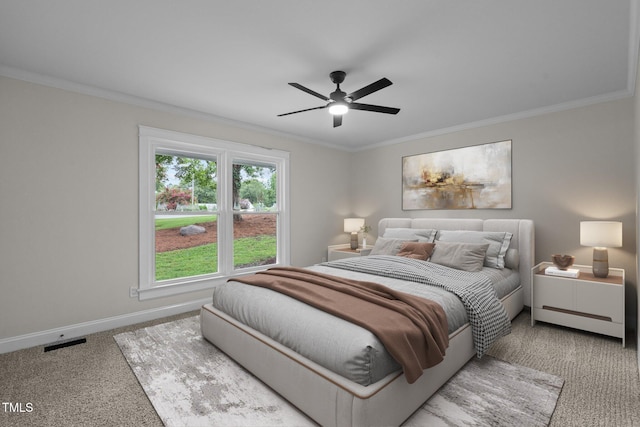 bedroom featuring ornamental molding, carpet flooring, visible vents, and baseboards