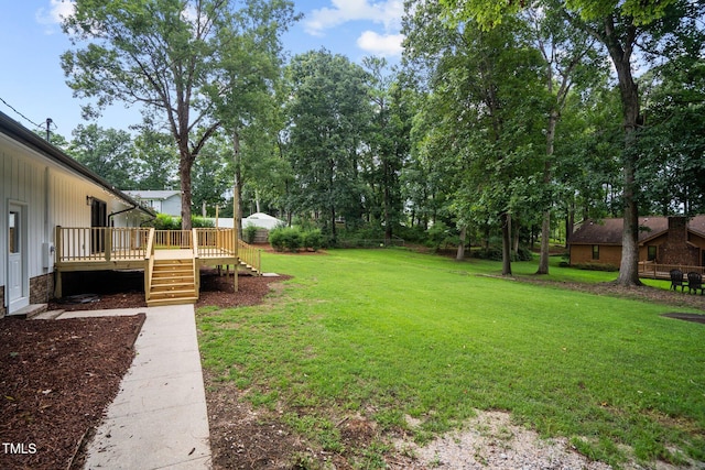 view of yard featuring a deck