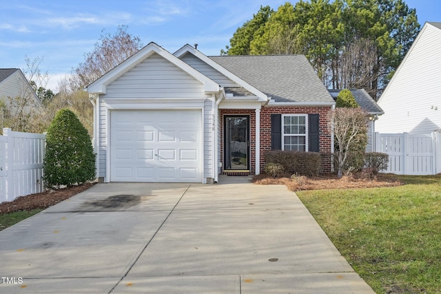 view of front facade featuring a front lawn and a garage