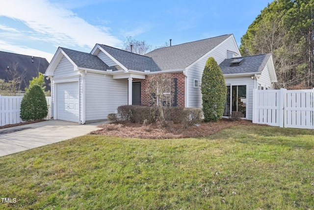 single story home with a front yard and a garage