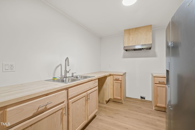 1411 Rosewood St, Durham, NC 27701 - kitchen featuring stainless steel fridge with ice dispenser, light brown cabinets, ornamental molding, a sink, and light wood-style floors